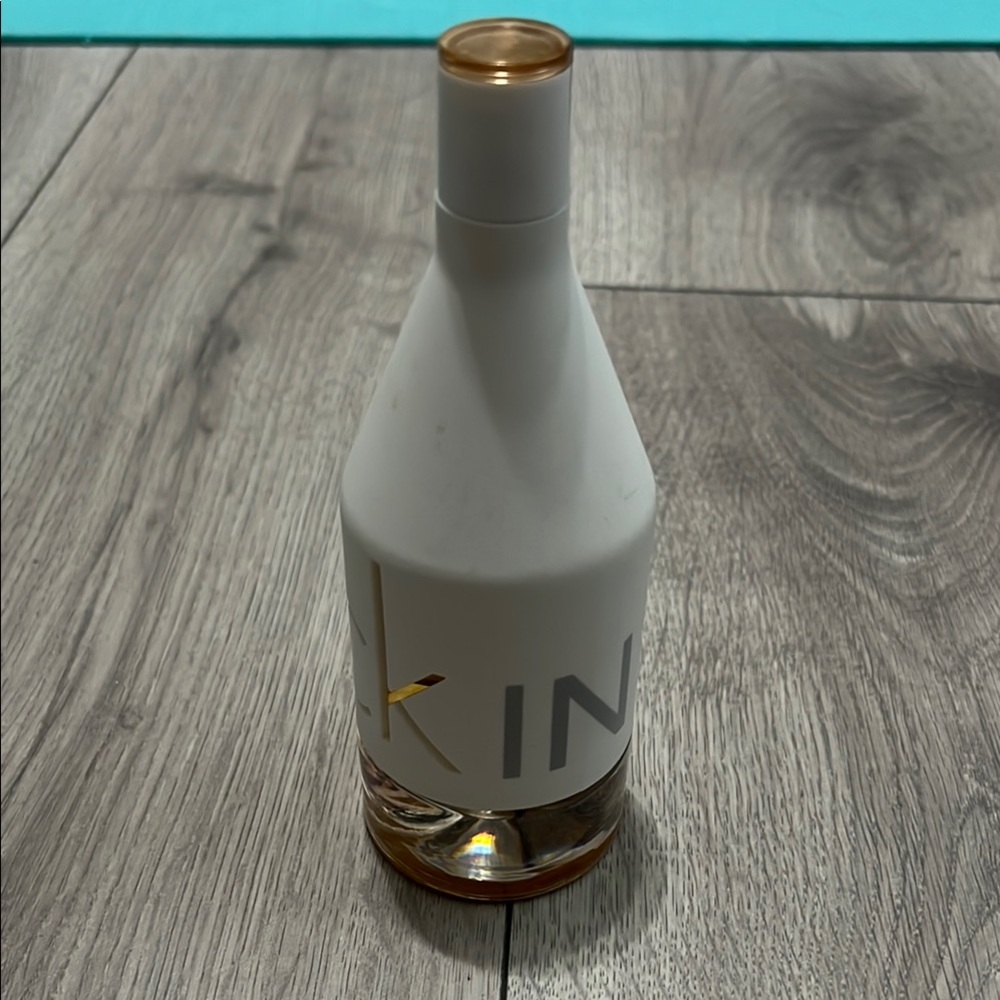 Calvin Klein White Bottle with Gold Trim perfume 100ml